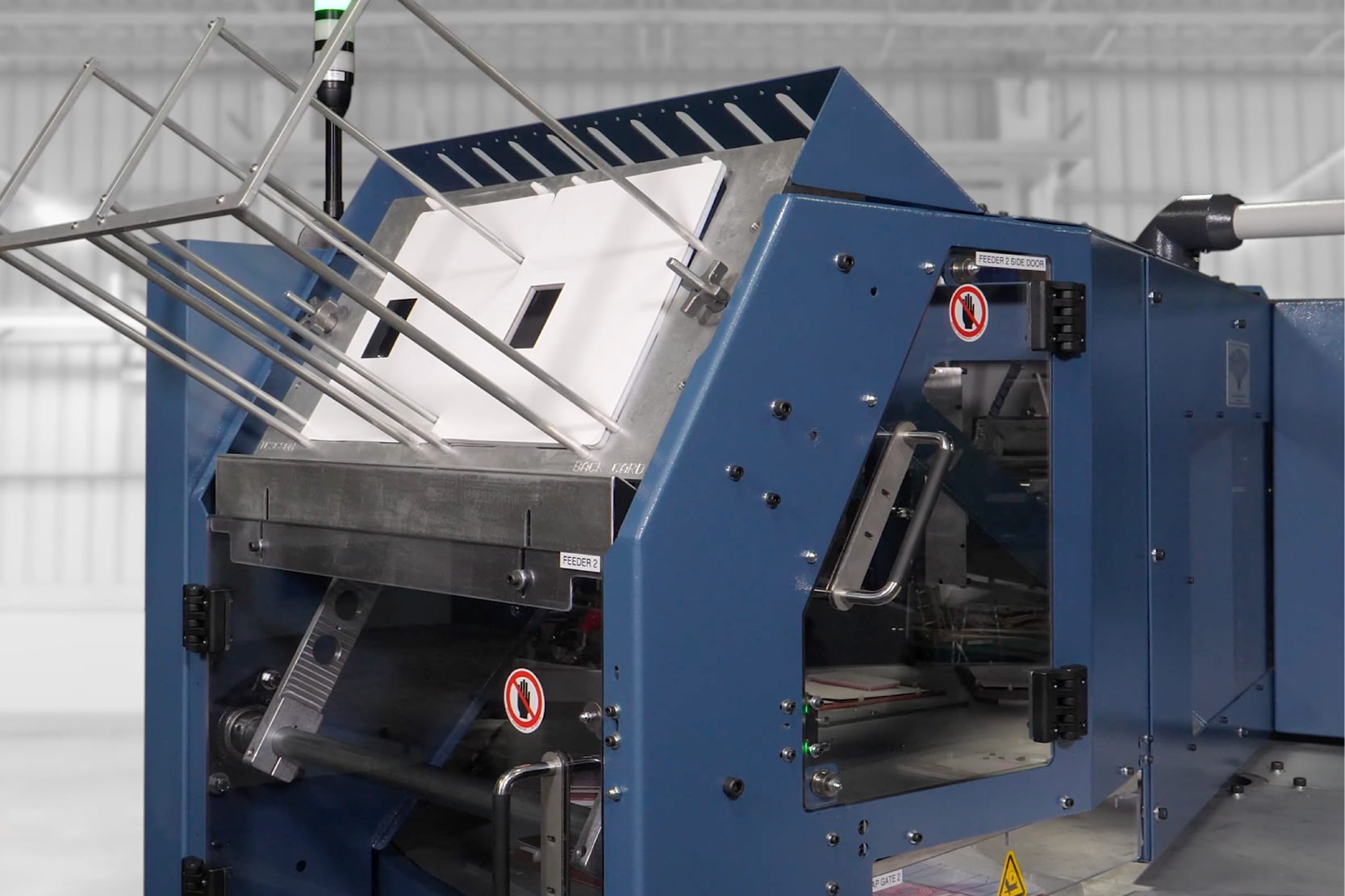 Automatic front card feed module